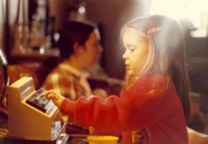 little-angie-at-cash-register